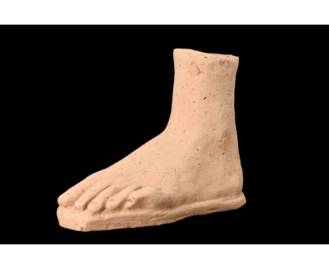 Ca. 200BC - 200AD.A model of a human left foot crafted from terracotta. This votive offering showcases meticulous attention t