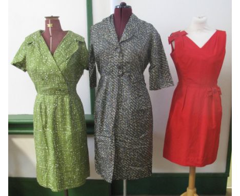 Three vintage 50's/60's day dresses to include; a green abstract cotton print wiggle dress with wide lapel and button detaili