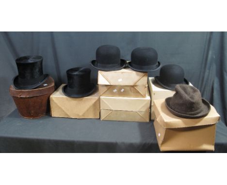 Collection of early 20th Century vintage men's hats in five cardboard hat boxes and one leather hat box (A.W Gamage Ltd Holbo