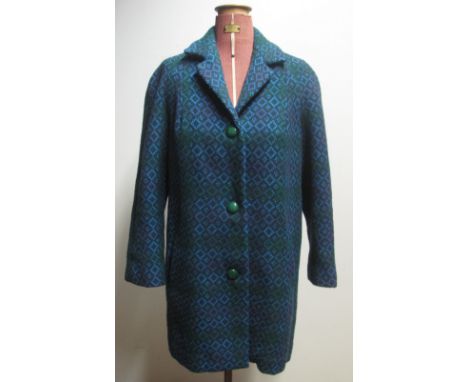 Green ground geometric design Welsh tapestry coat with 100% pure virgin wool by Mari Lloyd label. (B.P. 24% incl. VAT)
