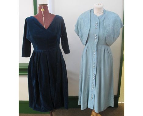 Two vintage dresses, one is a pale blue 1940's linen button up sleeveless dress by Tudor with a matching broderie anglais sho