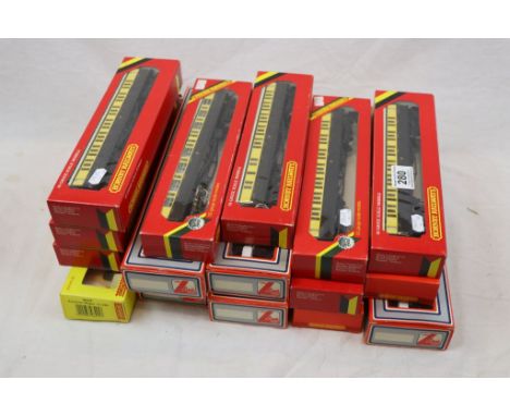 16 Boxed OO gauge model railway items of rolling stock coaches to include Hornby x 11 and Lima x 5