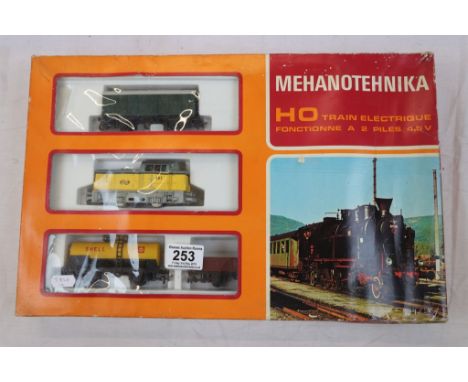 Boxed Mehanotehnika HO scale electric train set (Yugoslavia) with locomotive and 3 items of rolling stock