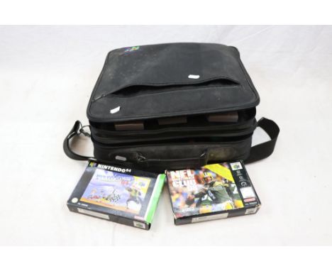 Nintendo 64 console and two controllers (grey &amp; green) including 11 games 3 x boxed Pilotwings, NFL 98, NHL 99, 8 x unbox