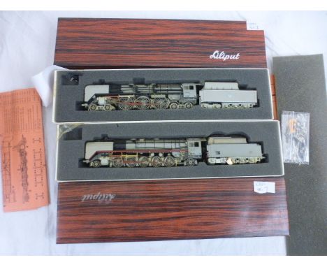 Two boxed Liliput HO scale locomotives to include 4502 2-10-2 in grey and 10502 4-6-4 in grey both with paperwork