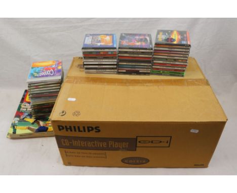 Philips CDI 210 CD interactive player, with approx 45 games, CDi magazines, controllers, power cables and user manual etc (2)