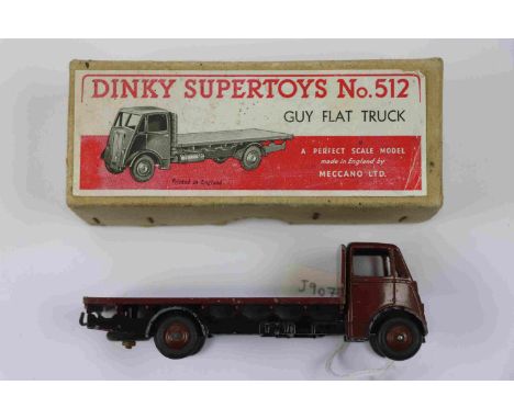 Boxed Dinky Supertoys No 512 Guy Flat Truck in maroon, maroon hubs, some paint loss, fair/gd box overall