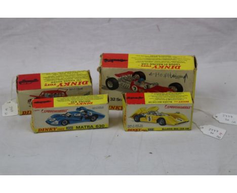 Three boxed Dinky diecast models to include 1:32 scale 225 Lotus F1 Racing Car in metallic red, vg, with inner display stand,