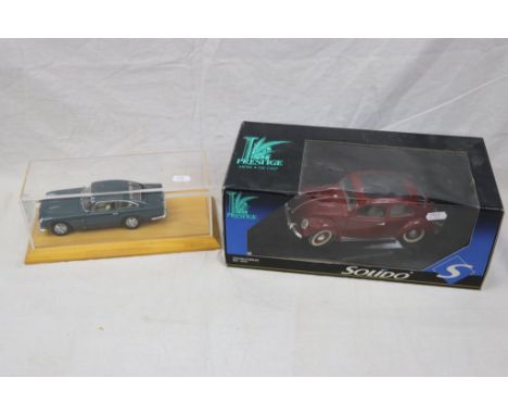 Two boxed/cased diecast models to include Solido Prestige 8025 Coccinelle Berline and Dabury Mint ltd edn 1964 Aston Martin D