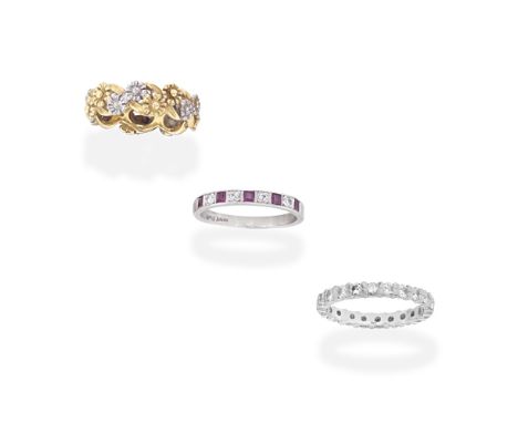 THREE RINGS1st: Set to the front with alternating brilliant-cut diamonds and step-cut rubies, 2nd: The eternity band set thro