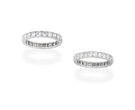 TWO DIAMOND ETERNITY RINGSEach set with brilliant and old brilliant-cut diamonds, diamonds approx. 2.00cts total,  ring sizes