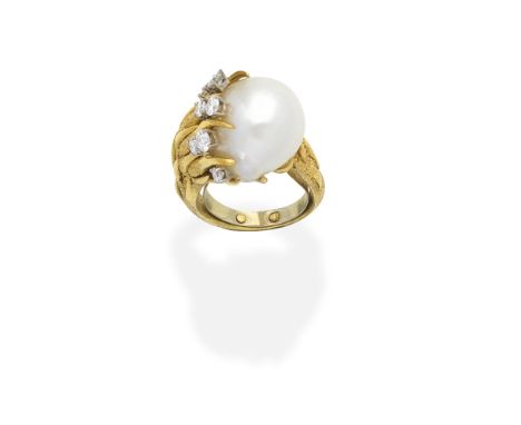 CULTURED PEARL AND DIAMOND DRESS RINGThe baroque-shaped cultured pearl within a textured and polished mount accented by brill