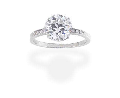 DIAMOND SINGLE-STONE RINGSet with an old brilliant-cut diamond weighing 2.27 carats, between single-cut diamond shoulders,  r