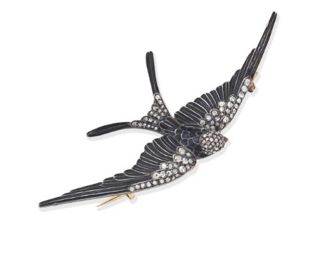 ENAMEL AND DIAMOND BIRD BROOCHModelled as a swallow in flight, decorated with navy blue enamel and rose-cut diamonds, accente