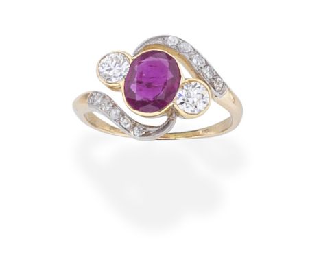 RUBY AND DIAMOND RINGThe oval-cut ruby collet-set between two brilliant-cut diamonds with single-cut diamond scrolling should