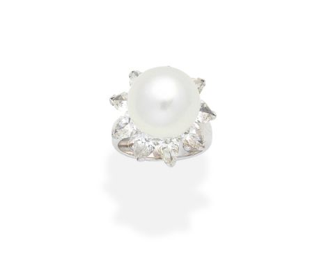 CULTURED PEARL AND DIAMOND CLUSTER RINGThe 13.5mm cultured pearl, within a pear-shaped diamond surround, diamonds approx. 3.6