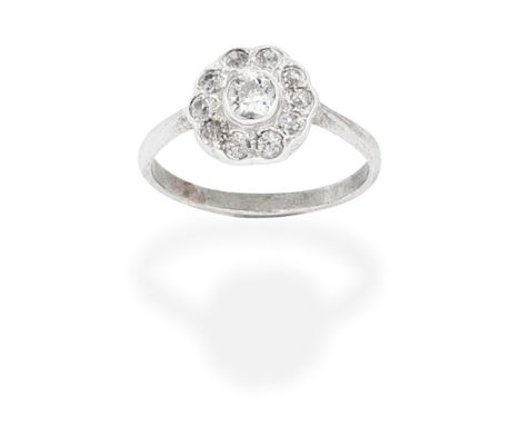DIAMOND CLUSTER RINGSet with a cushion-shaped diamond within a similarly-cut diamond surround,  diamonds approx. 0.80ct total