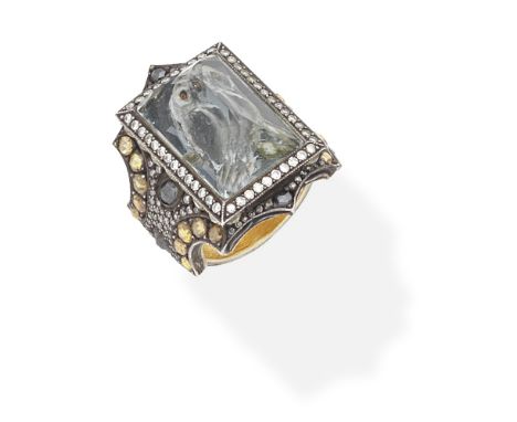 SEVAN BIÇAKÇI: DIAMOND AND COLOURED DIAMOND INTAGLIO RING, 2011The rock crystal reverse carved to depict an owl, within a mou