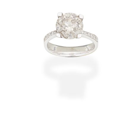 DIAMOND SINGLE-STONE RINGSet with a brilliant-cut diamond, weighing 3.53 carats, between similarly-cut diamond shoulders, rin