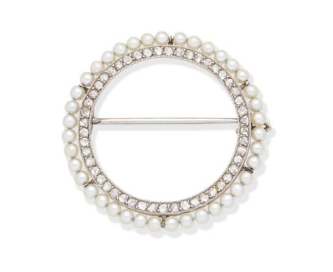 CARTIER: SEED PEARL AND DIAMOND BROOCH, CIRCA 1925The circular brooch with a rose-cut diamond inner circle, framed within a s