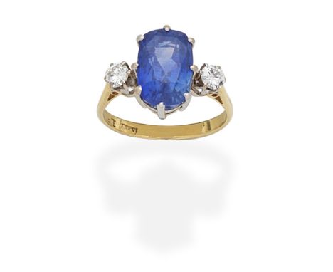 SAPPHIRE AND DIAMOND RINGThe cushion-shaped sapphire between brilliant-cut diamond shoulders, diamonds approx. 0.40ct total, 