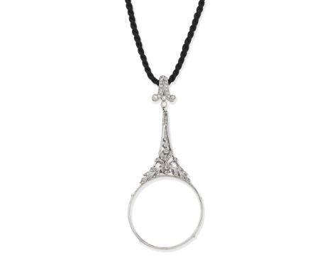 DIAMOND SET LORGNETTE, CIRCA 1925The openwork handle of floral and foliate design set to both sides with rose-cut diamonds, o