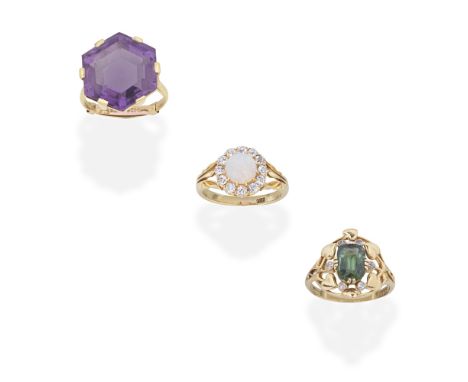 THREE GEM-SET RINGS1st: Set with a hexagonal-shaped amethyst, 2nd: The opal cabochon within a surround of cushion-shaped diam