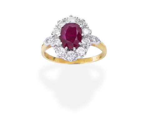 RUBY AND DIAMOND RINGThe oval-cut ruby within a brilliant-cut diamond surround, diamonds approx. 1.00ct total,  ring size S1⁄