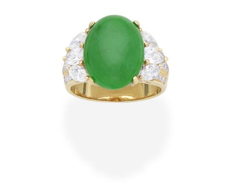 JADE AND DIAMOND RINGThe oval jadeite jade cabochon between pear, marquise and brilliant-cut diamond shoulders, diamonds appr