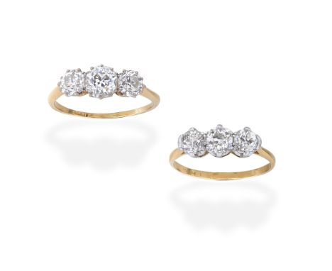 TWO THREE-STONE DIAMOND RINGSEach set with old brilliant-cut diamonds,  diamonds approx. 4.10cts total, ring sizes approx. S 
