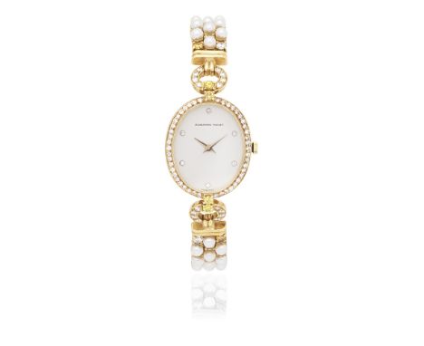 AUDEMARS PIGUET: DIAMOND, COLOURED DIAMOND AND CULTURED PEARL  WRISTWATCH, 1984The oval dial with diamond hour markers, withi