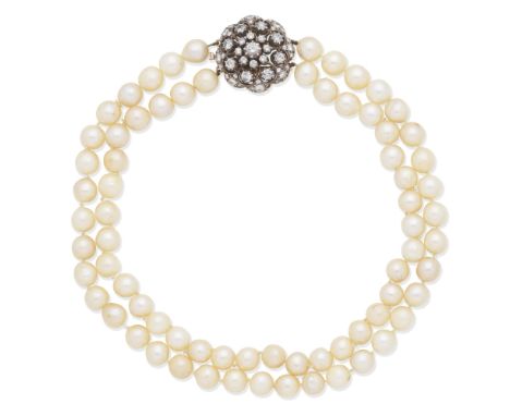 CULTURED PEARL NECKLACE WITH DIAMOND CLASPThe two rows of 8.5mm cultured pearls on an old brilliant-cut diamond clasp of open