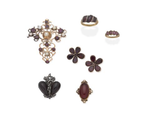 COLLECTION OF GARNET-SET JEWELLERY, 19TH CENTURY1st: The pendant set with oval and pear-shaped garnets in closed-back setting