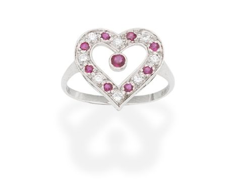 RUBY AND DIAMOND HEART RING, 1999The openwork heart set with circular-cut rubies and brilliant-cut diamonds, mounted in 18 ca