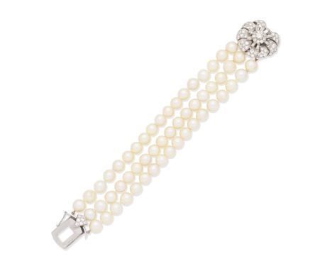 CULTURED PEARL AND DIAMOND BRACELETThe three rows of 7.5-8.0mm cultured pearls, on a mid 20th century clasp of flowerhead des
