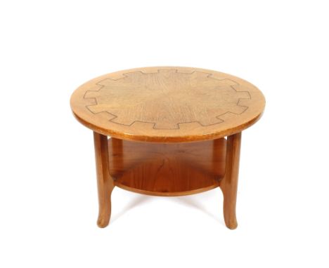 A light oak circular two tier coffee table with Greek key decoration, 86cm dia. 