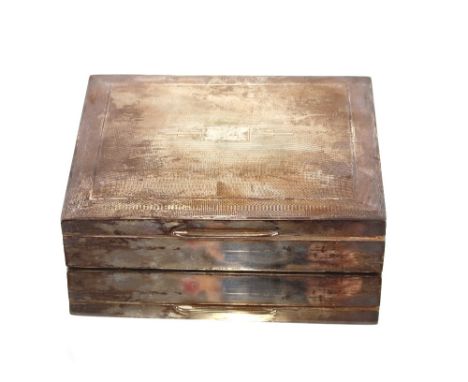 A silver engine turned cigarette case of Art Deco design having wood lined two section interior 