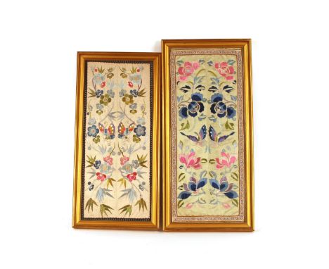 A pair of Chinese silk embroidered panels depicting flowers and butterflies, probably originally cloak sleeves, 49cm x 29cm 