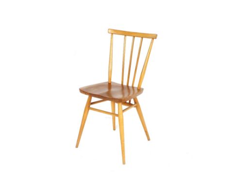 A set of four Ercol stick back chairs 