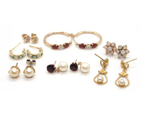 A mixed lot of gold, gemset and yellow metal earrings: to include a pair of green and white stone earhoops indistinctly stamp