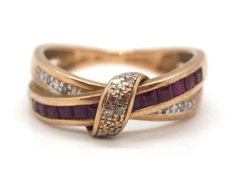 A 9ct diamond and synthetic ruby crossover ring, with two crossover bands, one sat with small round diamonds, the other with 