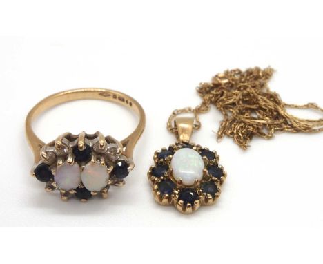 A 9ct opal and sapphire ring and similar pendant: the 9ct ring set with two oval opal cabochons surrounded by sapphires and w