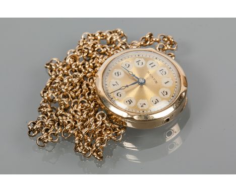 LADY'S EARLY TWENTIETH CENTURY NINE CARAT GOLD MENEX FOB WATCH
signed fifteen jewels manual wind movement, the gilt dial with