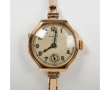 LADY'S 1930s NINE CARAT GOLD ROLEX COCKTAIL WATCH
circa 1937, signed fifteen jewels manual wind movement, the silvered dial w