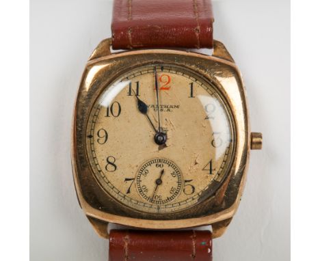 GENTLEMAN'S NINE CARAT GOLD CUSHION CASED WALTHAM WRISTWATCH
circa 1930s, signed nine jewels manual wind movement numbered 29