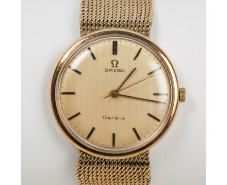 GENTLEMAN'S NINE CARAT GOLD OMEGA GENEVE WRISTWATCH WITH INTEGRAL STRAP
circa 1970, signed seventeen jewels calibre 601 manua