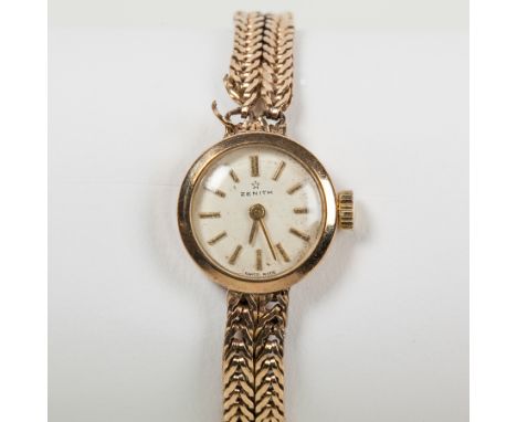 LADY'S TWENTIETH CENTURY NINE CARAT GOLD ZENITH COCKTAIL WATCH
signed seventeen jewels manual wind movement, the white dial w