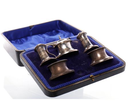 GEORGE V SILVER CRUET SETmaker R F Mosley & Co, Sheffield 1921, of round form with gadrooned rims, comprising two salt cellar