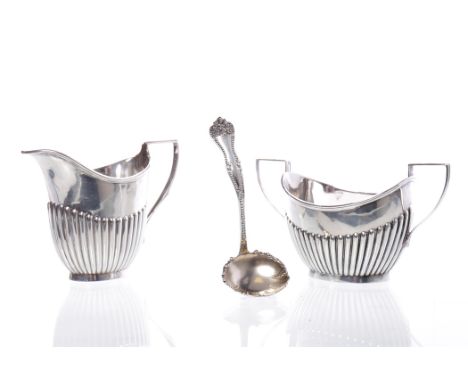 GEORGE V SILVER CREAM JUGmaker Jenkins & Timm, Sheffield 1925, of partially gadrooned oval form, approximately 138g, 9.5cm hi