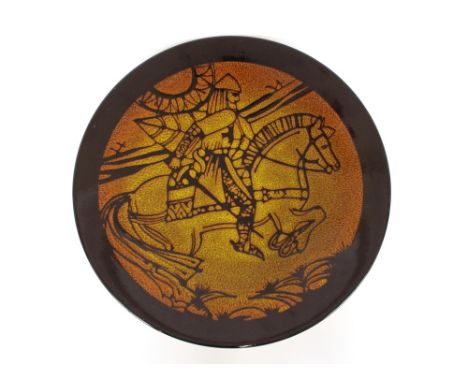 A large Poole pottery Aegaen charger decorated with figure of knight on steed, 40cm dia. 